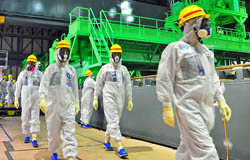 IAEA-Inspektoren in Fukushima (2013). Foto: Gregg Webb / IAEA, C