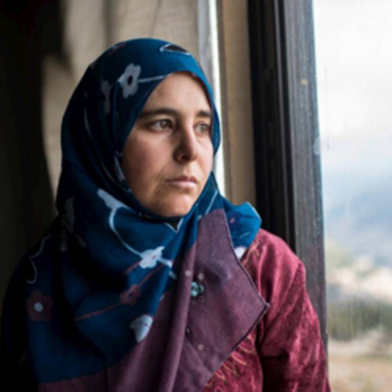 Die Syrerin Nasreen Ahmed floh mit ihren vier Kindern aus ihrer Heimat Homs, nachdem ihr Mann getötet wurde. © UNHCR/Lynsey Addario