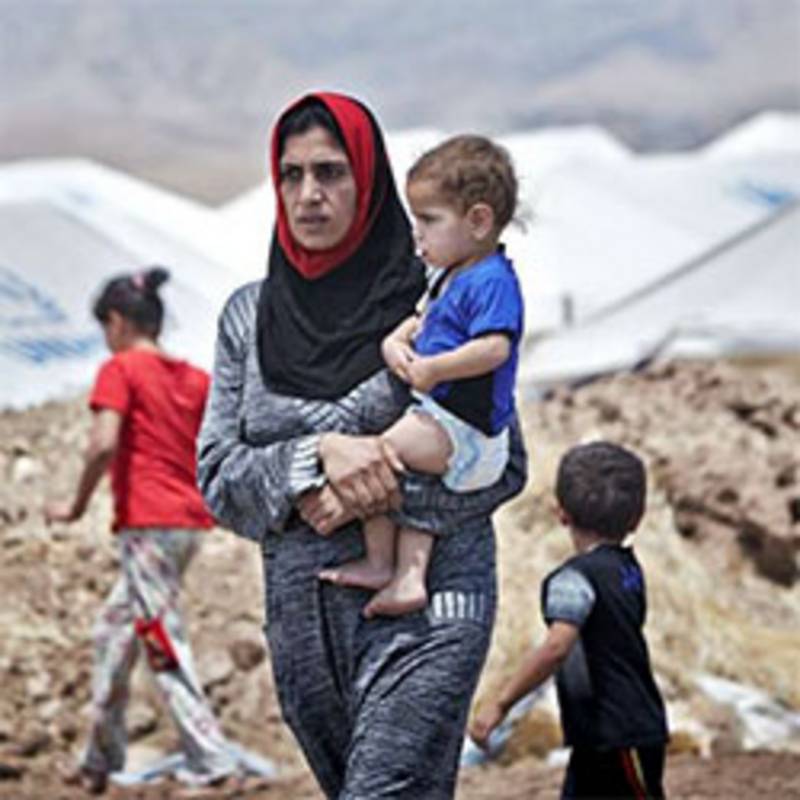 Irakische Frau aus Mosul mit ihrem Sohn im Garmava-Flüchtlingscamp. Foto: UNHCR, S. Baldwin        UNHCR, S. Baldwin
